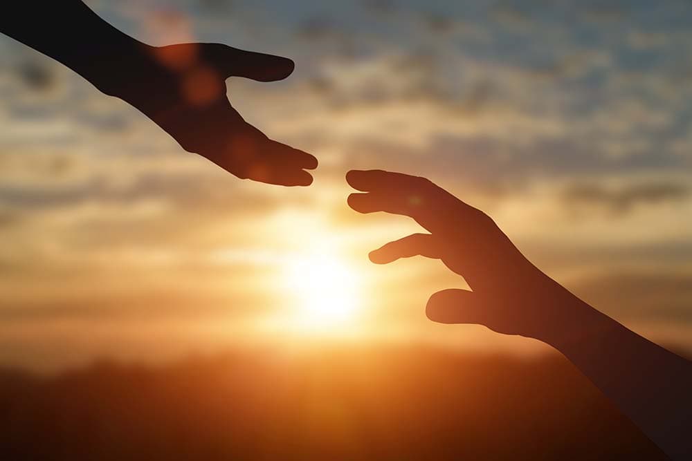 Professionals shaking hands to signify structured factoring partnership