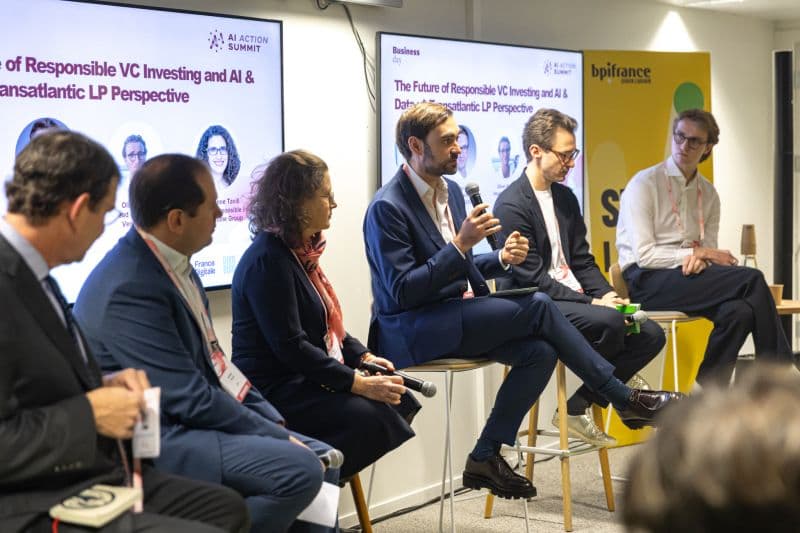 Business leaders discussing venture capital strategy